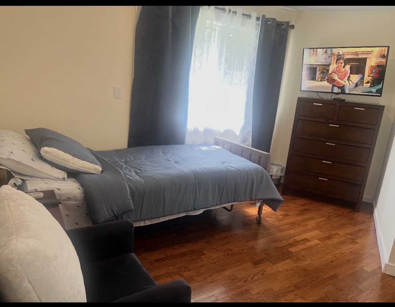 Comfortable furnished resident bedroom at Falconi UniqueCare
